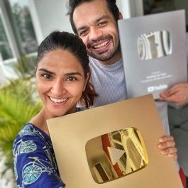 Gaurav-Taneja-with-his-Wife-Holding-YouTube-Play-Buttons