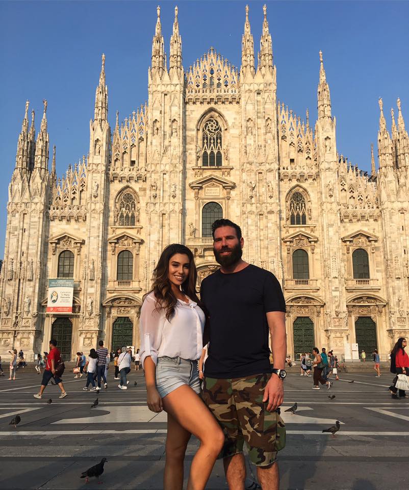 Bilzerian with a model in Italy