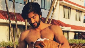 Mizan Jafri with a dog