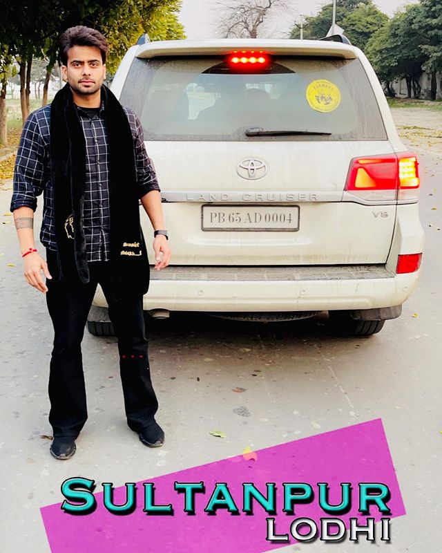 Mankirt Aulakh with one of his cars