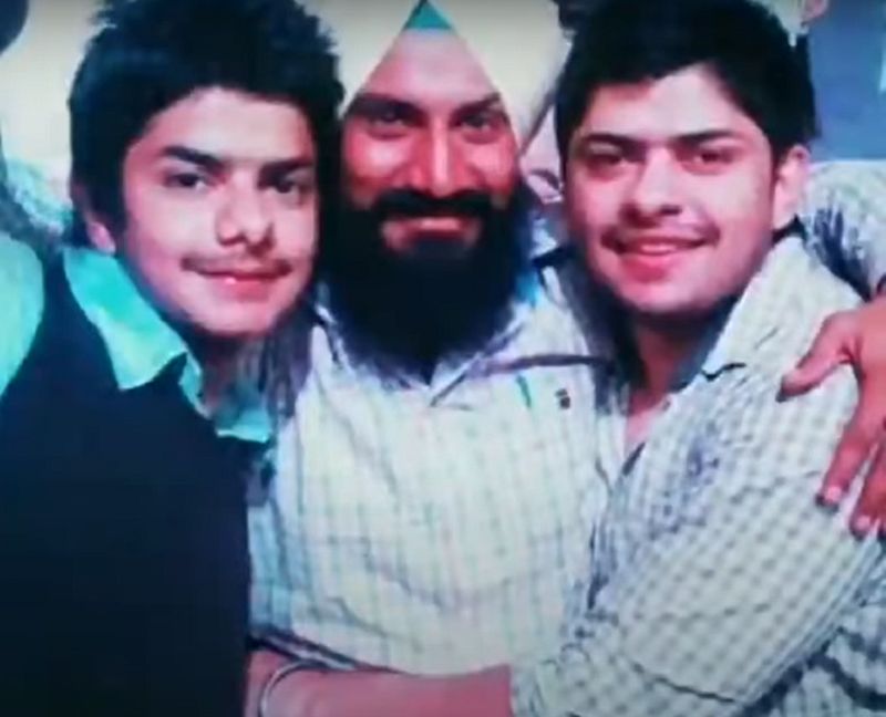 Lawrence Bishnoi with his brother and father