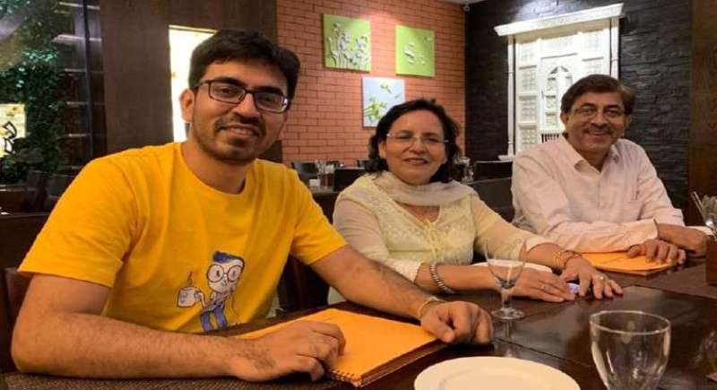 Pranjal Kamra with his mother and father