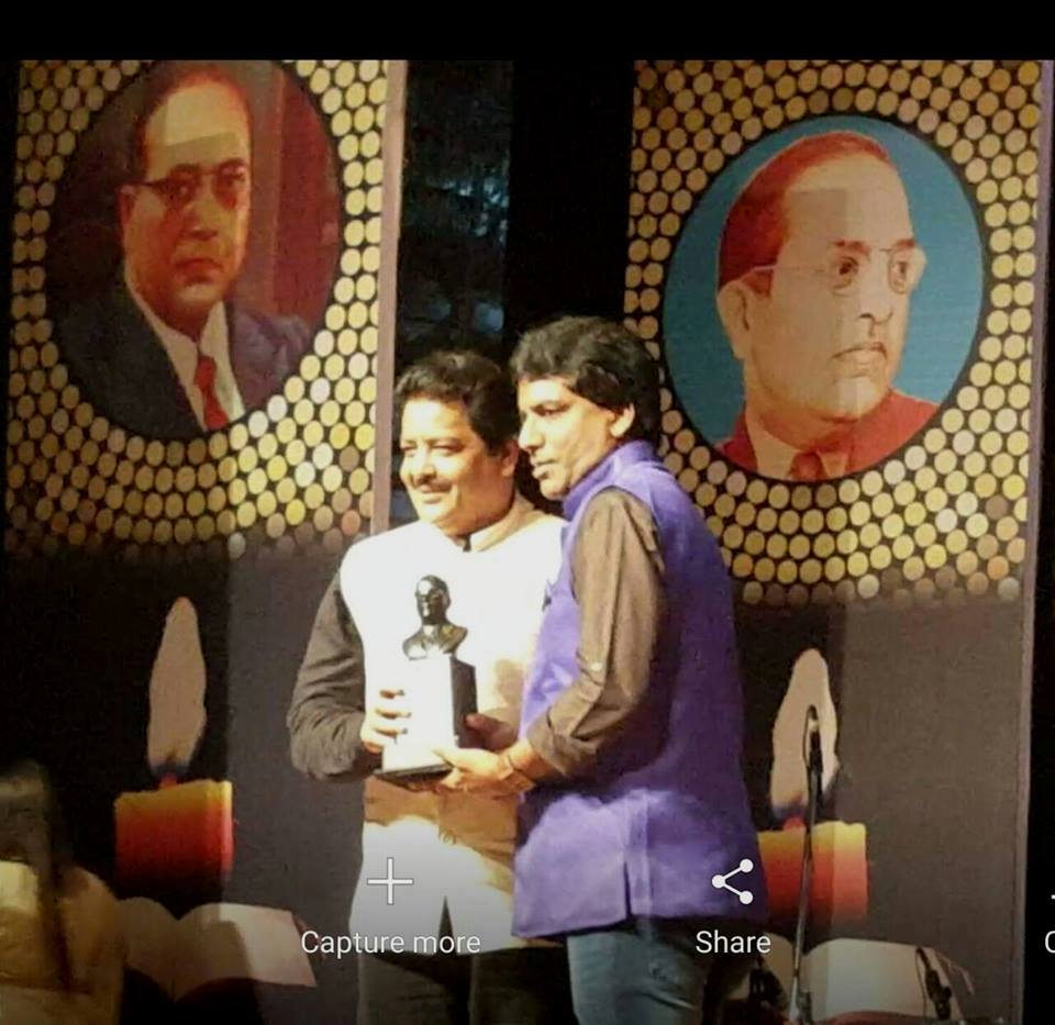 Dipoo Srivastava receiving awards