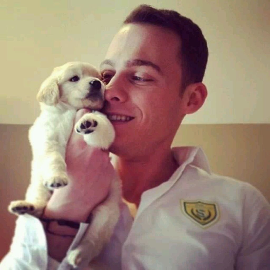 Young Kerem Bürsin with a cute dog
