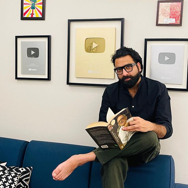 Anubhav Singh Bassi with his YouTube channel's Playbutton